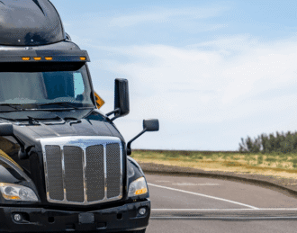 Transport Truck driving to truck shop repair near me