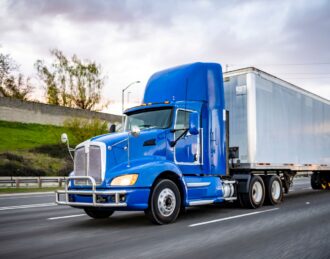 transport truck on way to a semi trailer repair shop near me